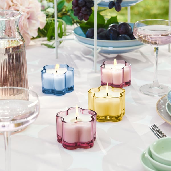 MORKULLA Scented candle in glass, Lilac assorted colours, 12 hr