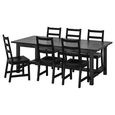 Black wooden dining set with extendable rectangular table and 6 matching chairs. Classic ladder-back design, sturdy and elegant.
