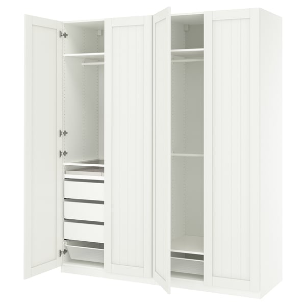 White PAX wardrobe with open doors, drawers, and shelves against a white background.