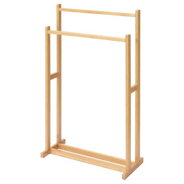 A RÅGRUND bamboo towel stand. Its light brown, rectangular, with two horizontal bars for hanging towels.