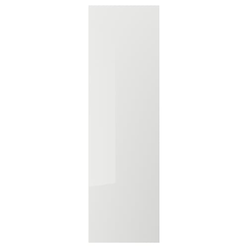 A sleek, vertical, white cabinet door from the RINGHULT series, known for its modern, high-gloss finish.