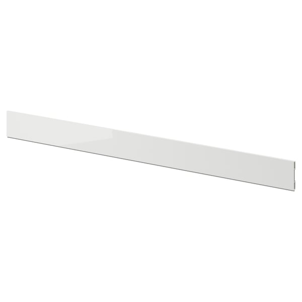 Displays a white RINGHULT kitchen cabinet front panel. Its rectangular, glossy, and made of plastic with a durable, easy-to-clean surface.