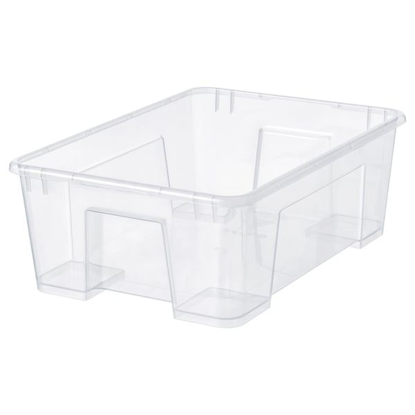 Clear plastic storage box, rectangle, organises items, visible, polypropylene, no lid.