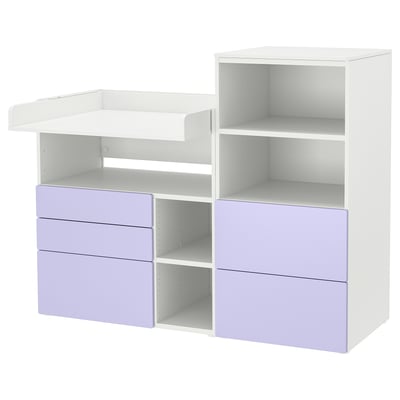 The SMÅSTAD unit white and lilac drawers, with open shelves for storage, perfect for a nursery or childs room.