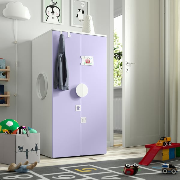 Kids room featuring lavender SMÅSTAD wardrobe, cloud shelf, and road rug.