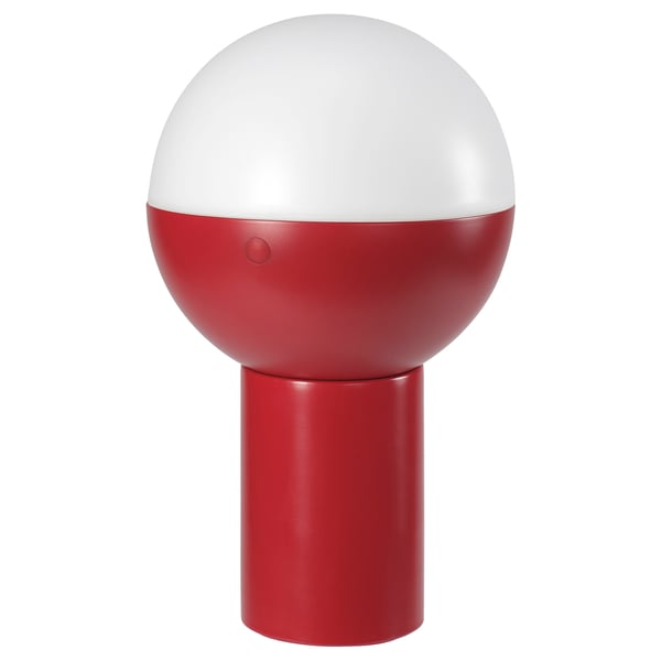 Red and white spherical table lamp with cylindrical base.