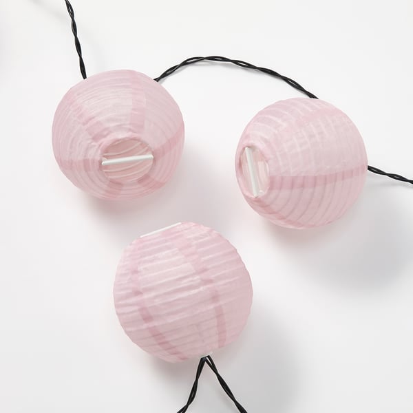 Pink lanterns with black wires.