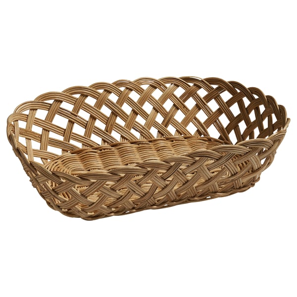 Handwoven rectangular brown rattan basket, rustic and sturdy, perfect for bread and fruit.