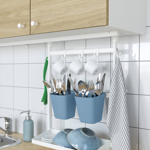 Well-organized kitchen setup with hanging containers and utensils, utilising SUNNERSTA accessories for efficient storage.