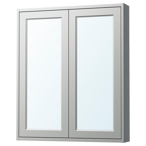 A TÄNNFORSEN light grey wall-mounted mirror cabinet with bevelled panels.
