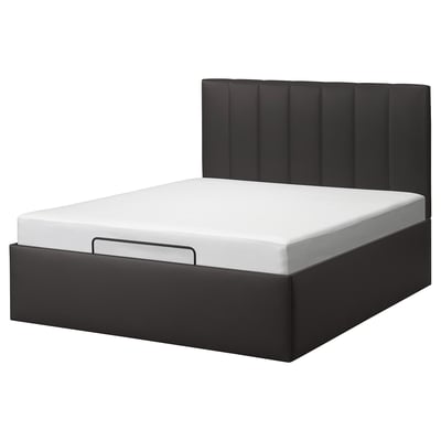 Modern black bed with padded headboard and built-in storage, sleek design.