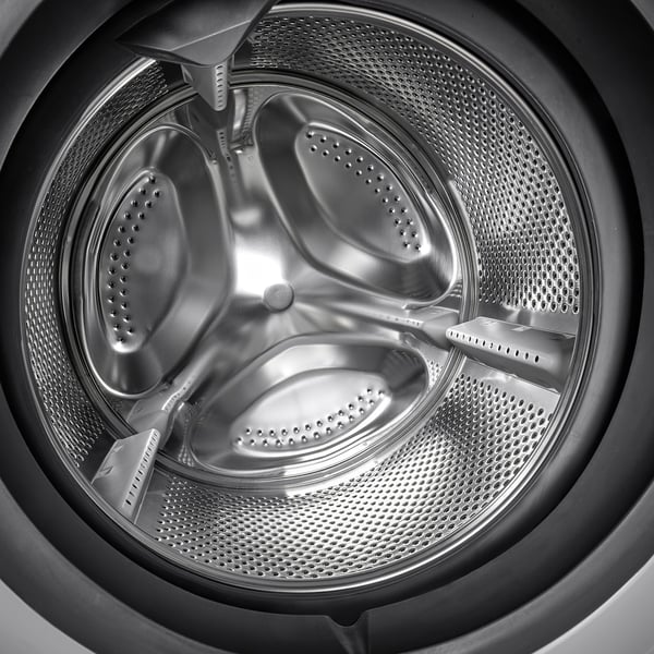 Washing machine drum with tri-fold stainless design and perforated outer edge for efficient drying.