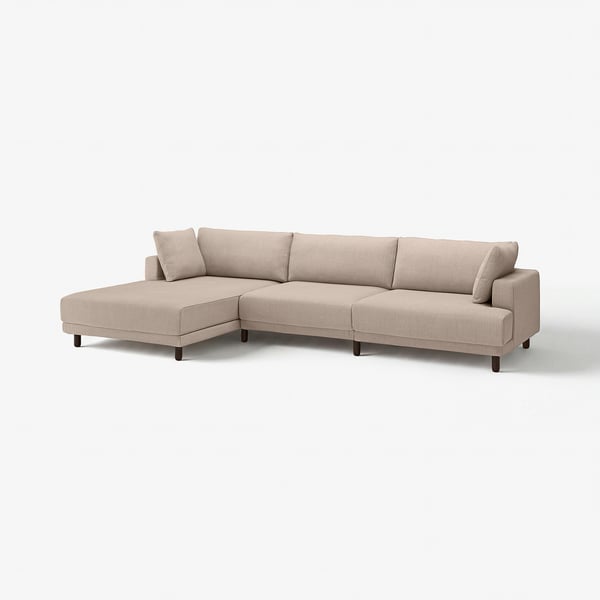 An UPPÅKRA sofa, a light beige, modern sectional with a sleek design and comfortable cushions.