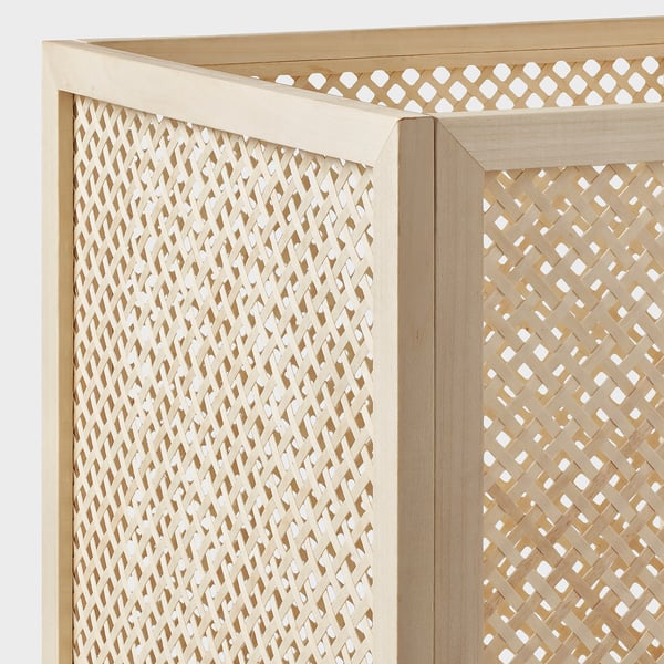 Close-up of VÄLTNING basket showing intricate, tightly woven cane design; natural beige colour.