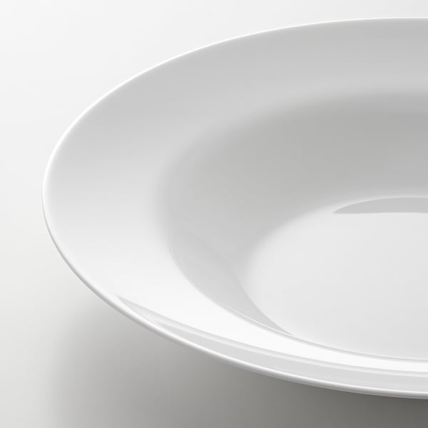 Smooth, sleek white glass bowl. Elegant design, refined feel.