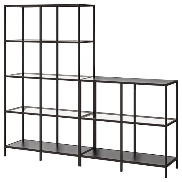 A VITTSJÖ bookshelf with black-brown and black panels, made of steel and glass, displaying a modern design.