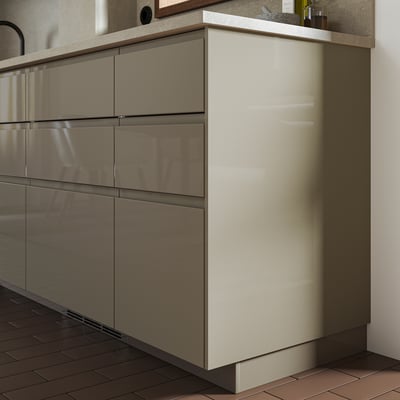 VOXTORP cabinet, modern design, glossy finish, grey colour, in kitchen setting.
