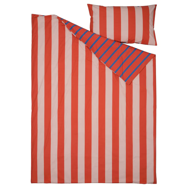 Red/white striped duvet set with blue diagonal pillowcase stripes, cotton with recycled materials.