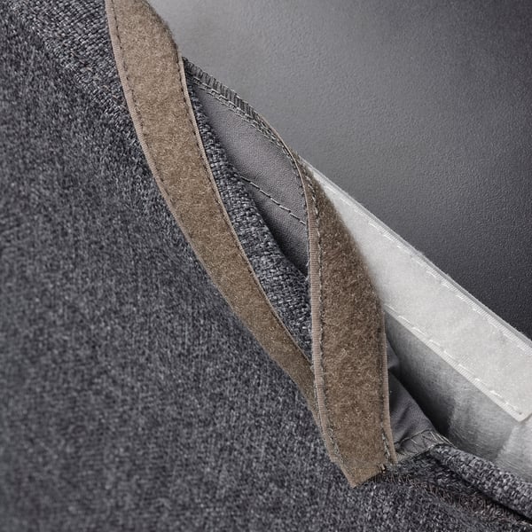 Close-up of grey BERGMUND bar stool cover, showcasing zip closure and removable, washable fabric.