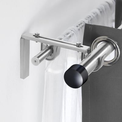 Small BETYDLIG nickel rod holder. Holds double curtain rods securely. Screws into wall bracket, fits räcka and hugad.