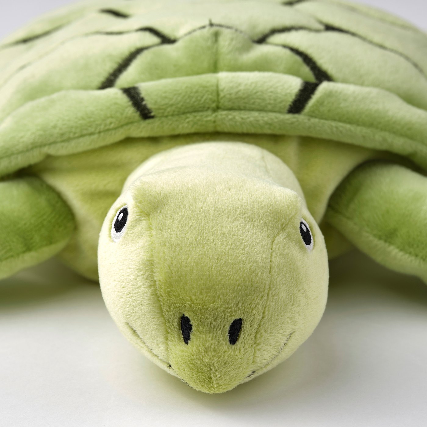 Cuddly green turtle cuddly toy, embroidered eyes and nose, soft recycled fabric, great for hugging.