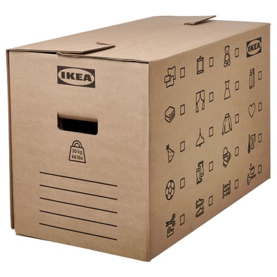 An IKEA DUNDERGUBBE cardboard moving box, brown, with cut-out handles for easy lifting, featuring various symbols for labelling contents.