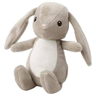 Grey stuffed bunny toy with long ears, white belly, sitting upright.