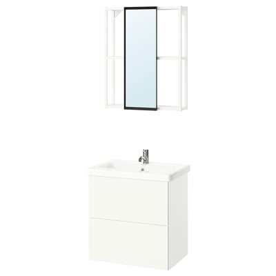 Modern white bathroom setup with wall-mounted sink cabinet, simple design, chrome fixtures, and mirror.