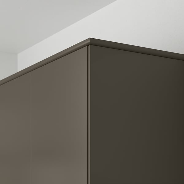 Black kitchen cabinet edges with sleek, straight lines and smooth finish, showing functional and clean design.