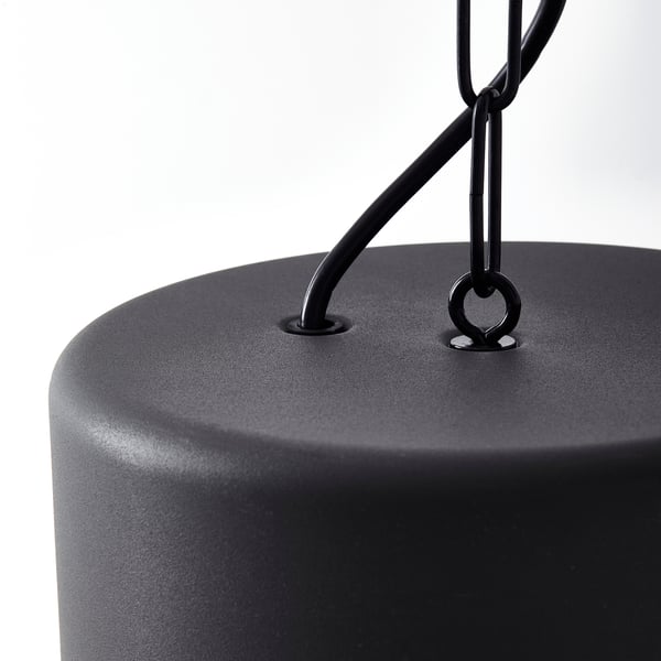 Modern lamp with sleek black metal design; robust and stylish.