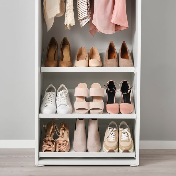 White shoe rack with 3 shelves, organising trainers, heels, & sandals efficiently.