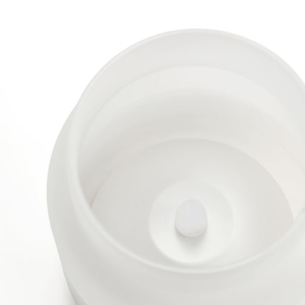 Smooth, frosted glass bowl on a white surface, showing quality design.