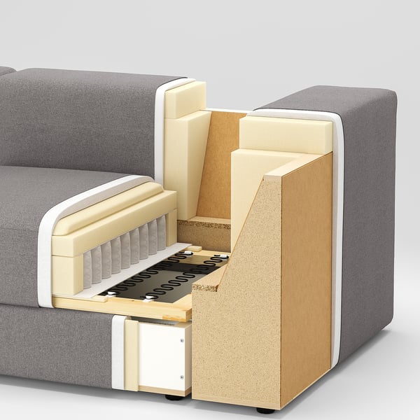 Modern couch with open storage. Grey upholstery, wooden frame, foam cushion, metal hardware visible.