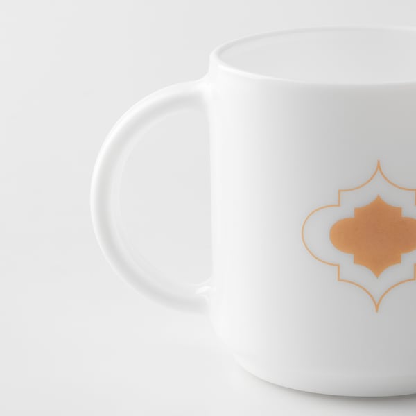 Golden mug or glass, dishwasher safe.
