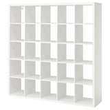 A white KALLAX cube shelving unit. Its square-shaped with multiple open storage compartments, ideal for various uses.