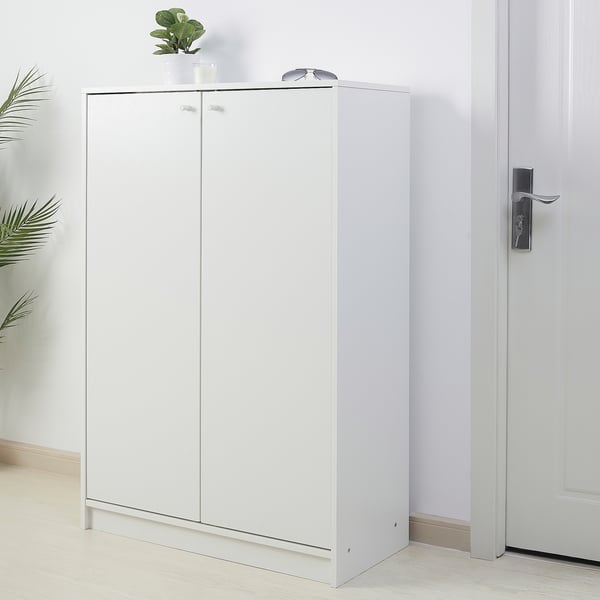 White KLEPPSTAD shoe cabinet in hallway, tall, sleek, organised.