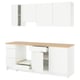 A white KNOXHULT kitchen set with wooden countertop, including cabinets and drawers for storage.