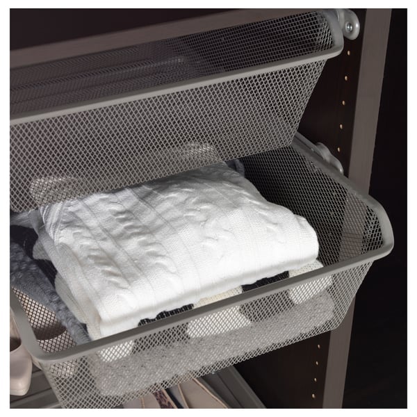 Mesh basket holds folded clothes, keeps items fresh with air circulation, and allows quick visibility of contents.