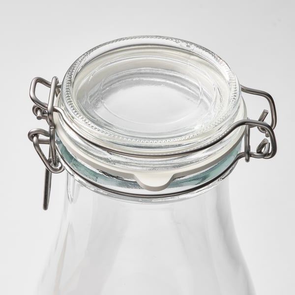 Closed glass jar with a secure metal clasp and rubber seal, showcasing quality and airtight storage.
