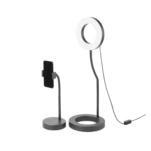 A ring light setup with phone holder; adjustable, dimmable, warm to cold light.