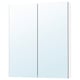 A white LETTAN wall cabinet with mirrored doors that offers storage and reflect light.