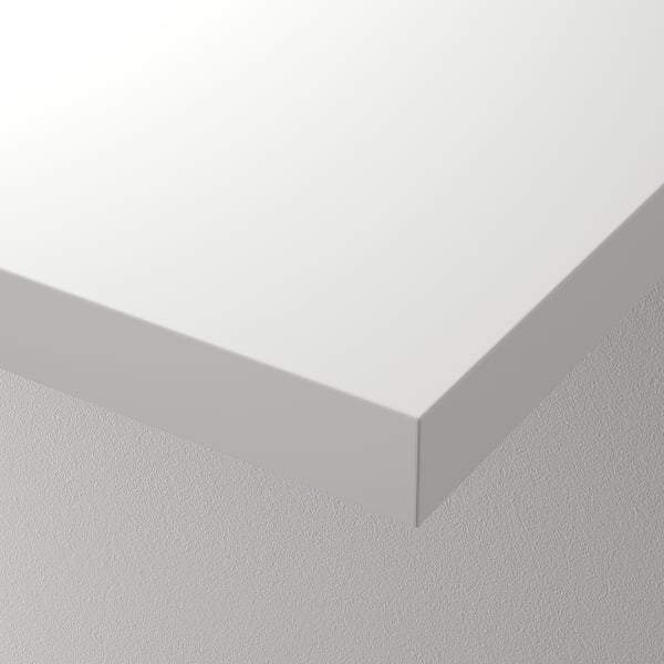 Clean, white corner with smooth, modern finish. Quality craftsmanship.