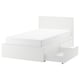 White MALM bed frame with open storage drawer, modern design.