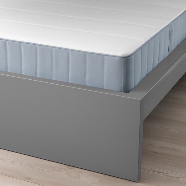 Adjustable bed with high headboard, ideal for reading or watching tv. Provides extra space for storage boxes.