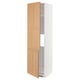 A METOD kitchen cabinet with vedhamn oak doors, white frame, and adjustable shelves.