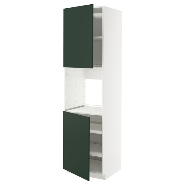 A tall, white ikea METOD kitchen cabinet with green doors and adjustable shelves.