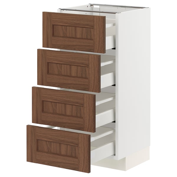 A white METOD kitchen cabinet with four wooden drawers.