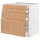 Modern kitchen unit with oak drawers, white frame, and robust design.