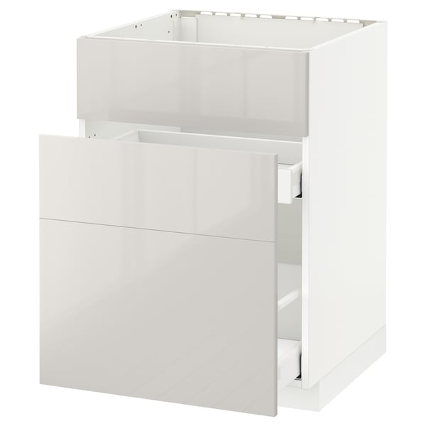 White METOD kitchen unit with glossy drawer, sleek modern design, sturdy particleboard structure.