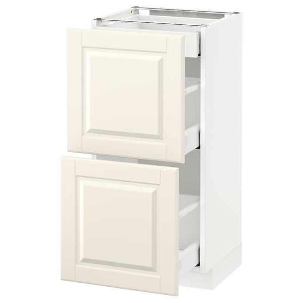 An off-white METOD kitchen cabinet with two drawers, featuring a traditional design with bevelled edges.